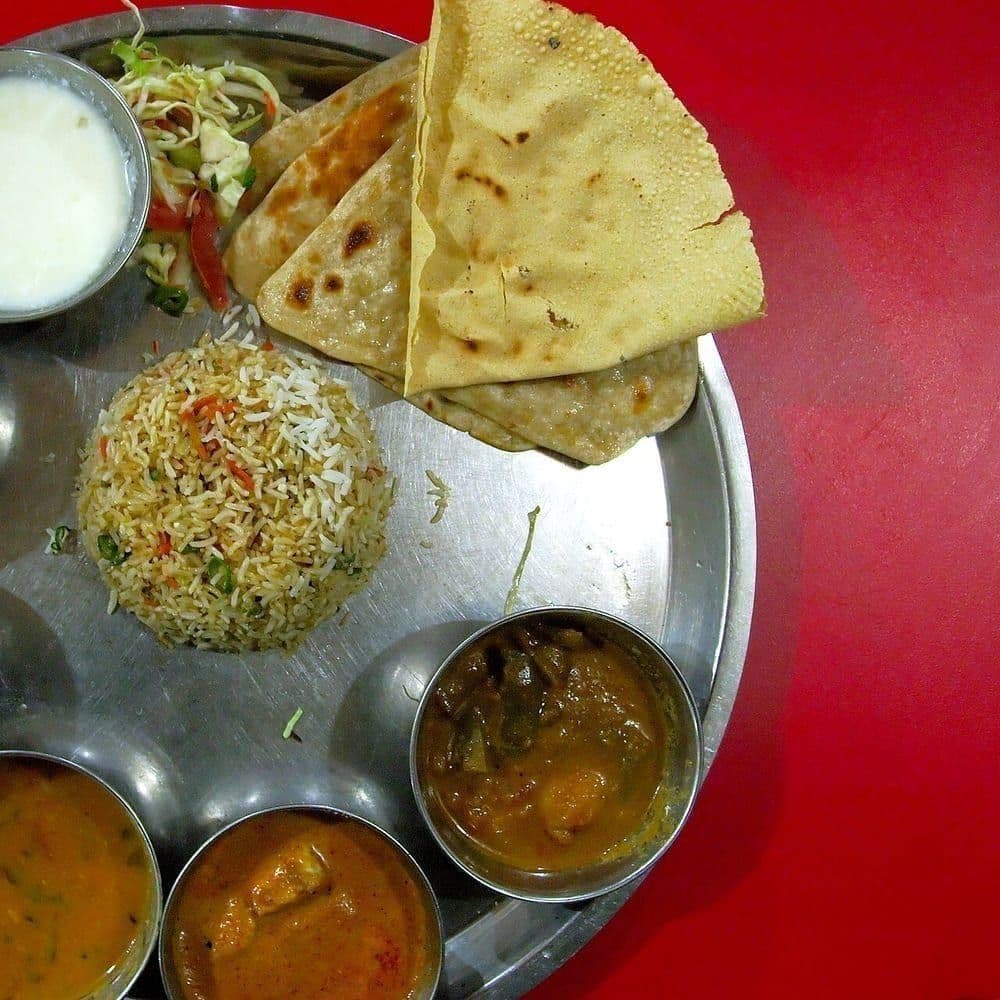 Next Level special thali with rice, sambar, curries and papad